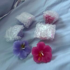 6 tea candles shaped like hawaiian flowers